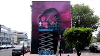 طرح گرافیکی زیبا بر روی ساختمانی در شهر مکزیکوسیتی بسیار زیبا_تایم لپس