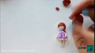 آموزش ساخت دختر گرگین با خمیر فیمو برای تزیین ماگ 3