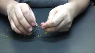 گره چند قلاب روی یک نخ ماهیگیری.ایران فیشینگ